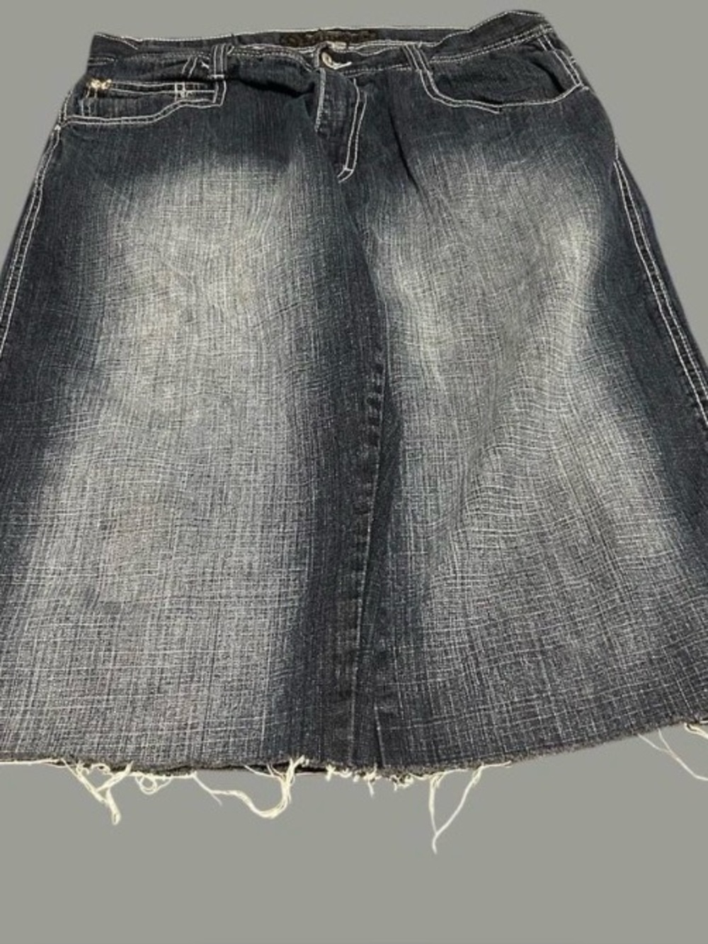 Navy faded south pole jorts in a size 38